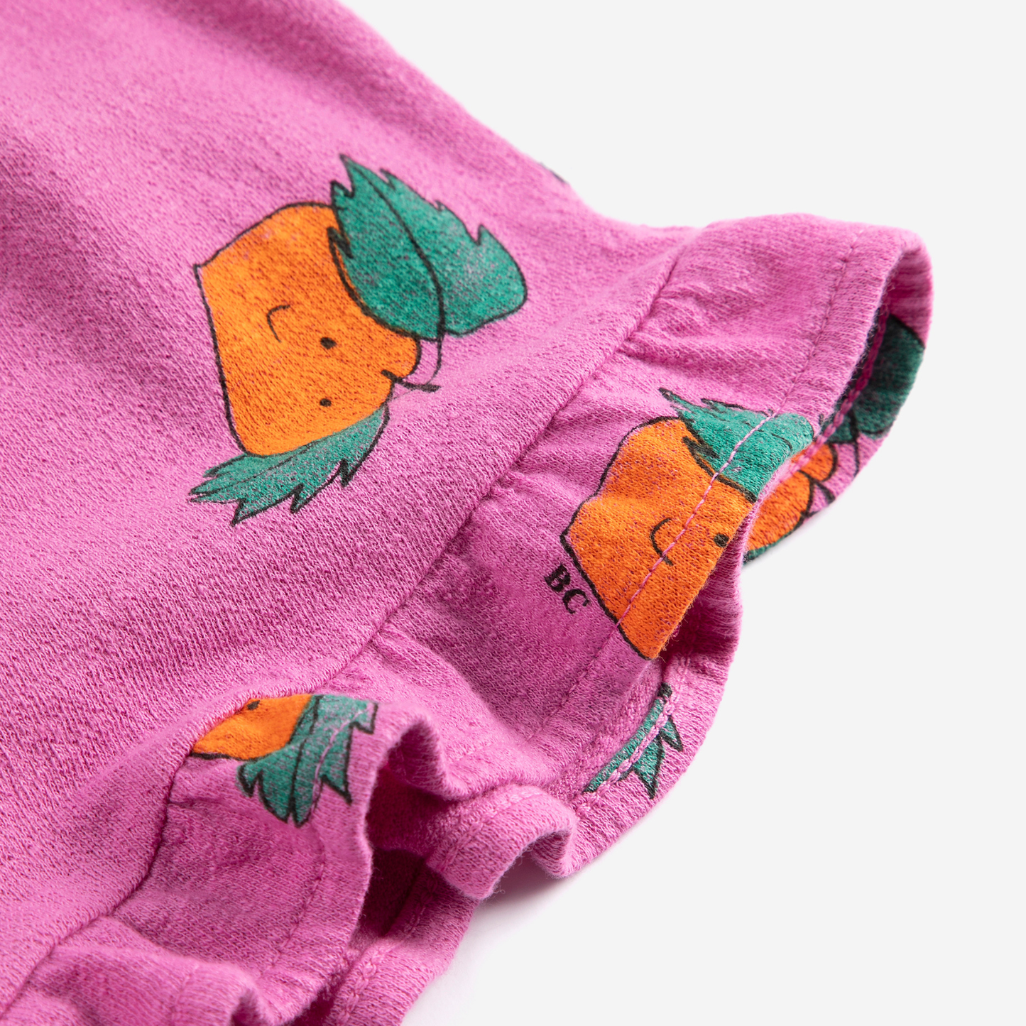 TANGERINE ALL OVER RUFFLED SHORTS